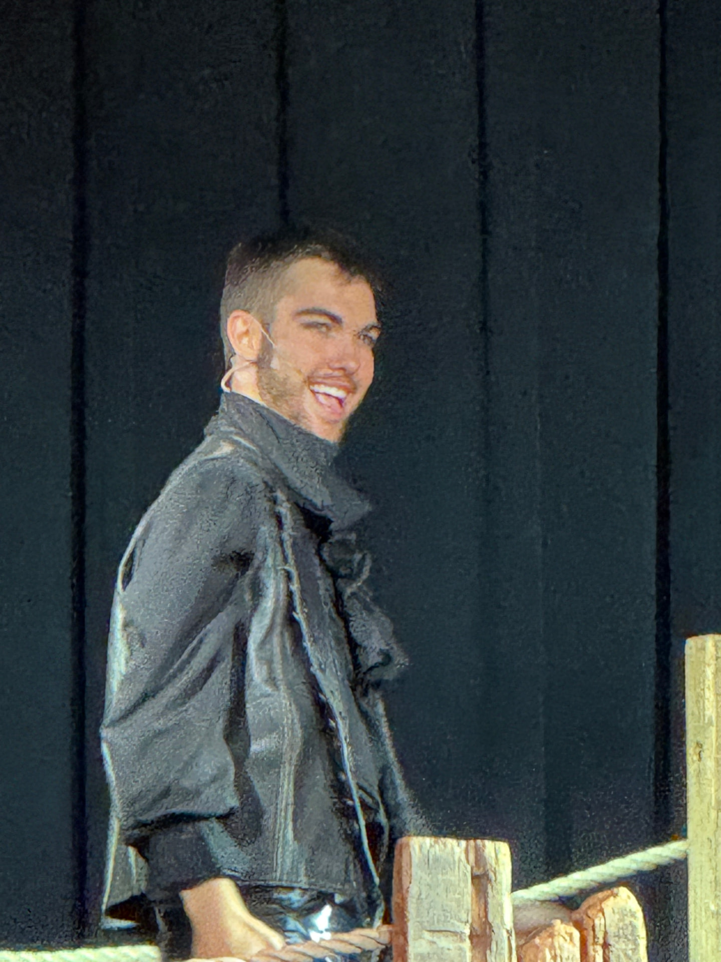 Richard Jordan smiling in costume backstage on the set